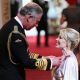 Kylie Minogue is honored by Prince Charles in London
