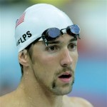 U.S.’ Michael Phelps takes a rest at the National Aquatics Center at the 2008 Beijing Olympics, Tuesday, Aug. 5, 2008