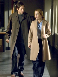 David Duchovny and Gillian Anderson as Mulder and Scully
