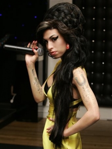 The wax figure of Amy Winehouse is unveiled at Madame Tussauds in central London