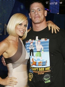 Jenny McCarthy with WWE wrestler John Cena at the WWE Smackdown Autism event