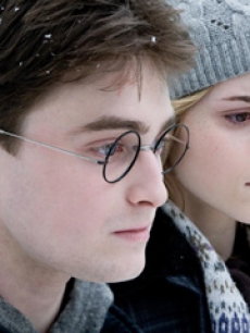 Daniel Radcliffe as Harry Potter and Emma Watson as Hermione Granger