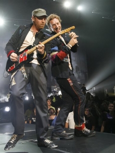 Coldplay’s Chris Martin and Jonny Buckland perform at the Air Canada Centre in Toronto