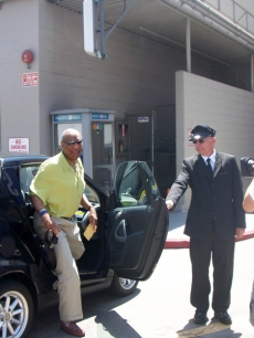Bill Cosby steps out of a Smart Car on the NBC lot in Burbank