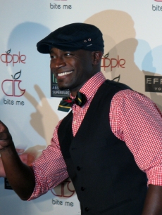 Taye Diggs sneaks in a quick peace sign