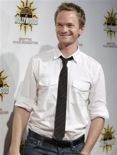 Neil Patrick Harris smiles in the press line for ‘Hot in Hollywood’