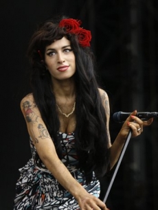 Amy Winehouse performs at the V Fest in Essex, England