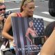Amanda Beard unveiled a controversial new PETA poster in Beijing outside Olympic Village, Wednesday morning.