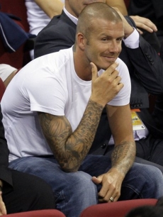 David Beckham watches the men’s gold medal basketball game between the USA and Spain