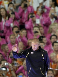 David Beckham waves during the closing ceremony for the 2008 Beijing Olympics