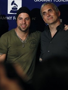 Musicians Chris Daughtry, left, and Art Alexakis pose together at the GRAMMY’s Rock The Conventions concert in Denver, late Tuesday Aug. 26, 2008