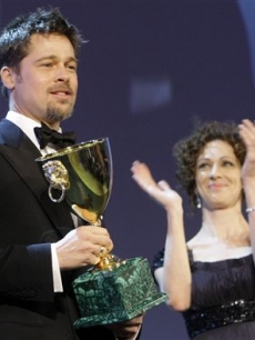 Brad Pitt wins the award for Best Actor at the Venice Film Festival