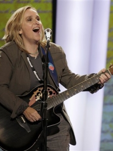 Singer Melissa Etheridge rehearses for her performance later in the day at the Democratic National Convention in Denver, Wednesday, Aug. 27, 2008