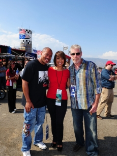 Maurice Greene, Cheryl Burke and Ron Perlman share a NASCAR moment in Fontana, Calif.
