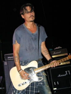 Johnny Depp performs with his band The Kids in Florida