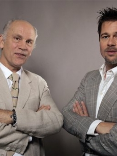 ‘Burn After Reading’ cast members John Malkovich and Brad Pitt pose for a photo at the Toronto Film Festival