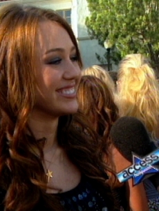 Miley Cyrus talks to Access Hollywood at the VMA’s