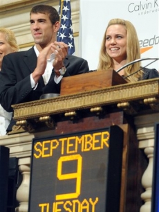 Olympic gold medalists Michael Phelps and Natalie Coughlin at the New York Stock Exchange