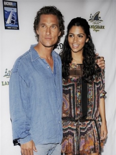 Matthew McConaughey, star of ‘Surfer, Dude,’  with his girlfriend Camila Alves at the premiere