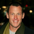 Champion cyclist Lance Armstrong smiles for the cameras at the ‘We Are Marshall’ premiere 