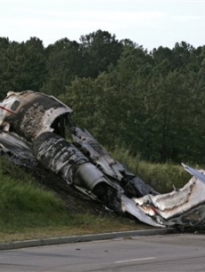 The wreckage of a Learjet that was carrying Travis Barker, DJ AM and four others