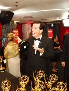 Stephen Colbert picks up his Emmy hardware backstage