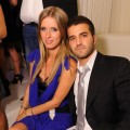 Nicky Hilton and boyfriend David Katzenberg smile inside PURE Nightclub at Caesears Palace