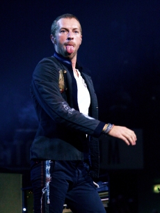 Chris Martin of Coldplay performs at the DatchForum