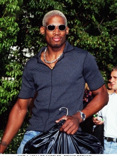 Madonna’s then-boyfriend, Dennis Rodman, arrives for the 1994 MTV Movie Awards, Los Angeles 