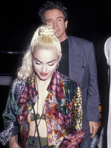 Then-couple Madonna and Warren Beatty head to a Blonde Ambition tour party, June 25, 1990 