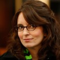 Tina Fey smiles on the set of ‘30 Rock’