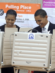 Michelle and Barack Obama cast their votes on Election Day in Chicago, Ill.