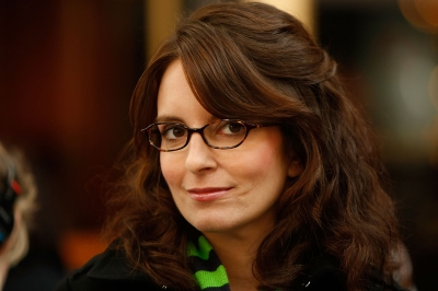 Tina Fey smiles on the set of ‘30 Rock’