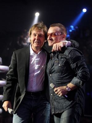 Paul McCartney and Bono hug on stage at the MTV Europe Music Awards in Liverpool, England 