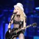Madonna plays guitar at her LA show
