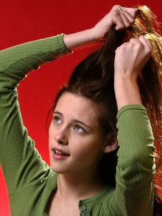 Kristen Stewart plays with her hair at Sundance, 2004