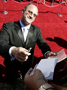 Christopher Meloni signs an autograph