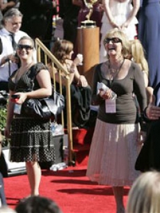 Jeffrey Tambor and John Lithgow have fun on the carpet