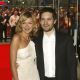 Kirsten Dunst and Tobey Maguire arrive at the UK film premiere of ‘Spider-Man 2’ at the Odeon Leicester Square on July 12, 2004