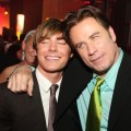 Zac Efron and John Travolta share an embrace at a ‘Hairspray’ afterparty, 2007