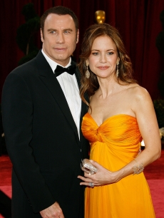 John Travolta and wife Kelly Preston arrive at the Academy Awards in February 2008