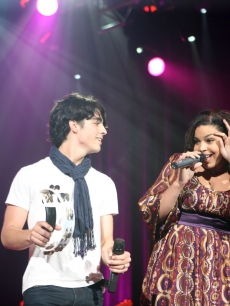 Joe Jonas of The Jonas Brothers and Jordin Sparks perform onstage at Ryman Auditorium on January 4, 2009 in Nashville, Tennessee