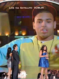 Jordin Sparks and Chris Brown (via satellite) accept the People’s Choice Award for Combined Forces