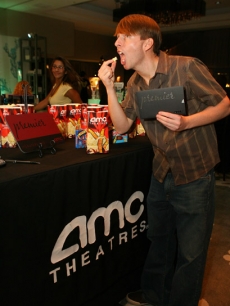 Jack McBrayer enjoys the popcorn and an AMC Entertainment signature movie pass at Access’ Stuff You Must lounge