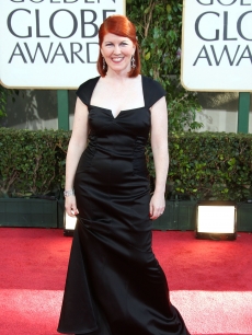 Kate Flannery from NBC’s ‘The Office’ sports a black dress on the red carpet