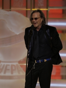 Mickey Rourke takes to the stage after winning his Golden Globe