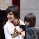 Katie Holmes smiles as she and Suri head out in NYC, Jan. 8, 2009