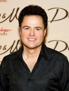 Donny Osmond poses after performing in the Donny & Marie variety show at the Flamingo Las Vegas