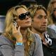 Kim Cattrall and chef Alan Wyse watch the match between Serena Williams and Venus Williams at the US Open