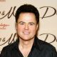 Donny Osmond poses after performing in the Donny & Marie variety show at the Flamingo Las Vegas